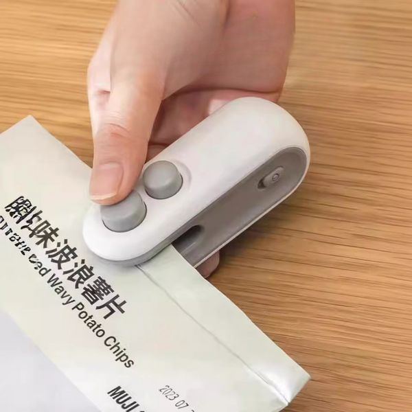 Ручний міні-запаювач пакетів від USB / Міні-пакувальник / Запаювач пакетів / Термопакувальник 234582677 фото