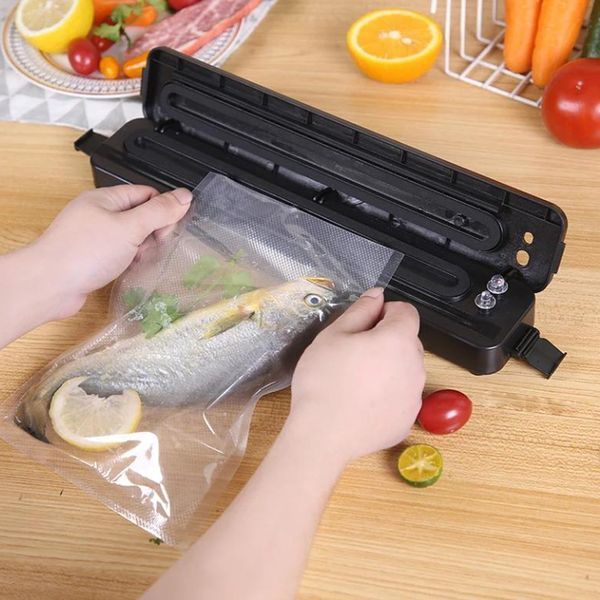 Кухонний вакуумний пакувальник Vacuum Sealer / Вакууматор продуктів / Машинка для вакуумування та запаювання пакетів 234562465 фото